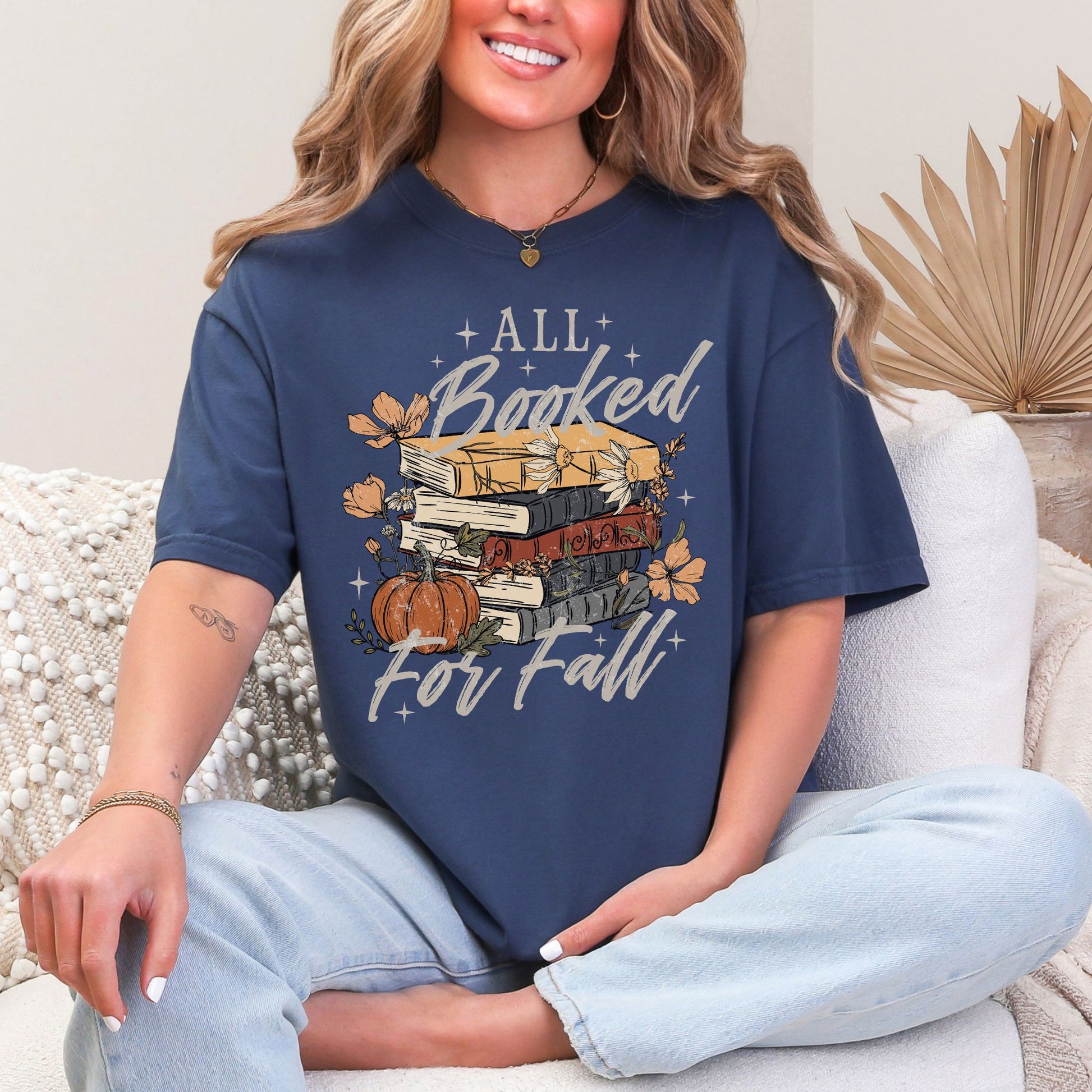 "All Booked for Fall" graphic on deep navy blue (navy) Comfort Colors 1717 T-Shirt. 