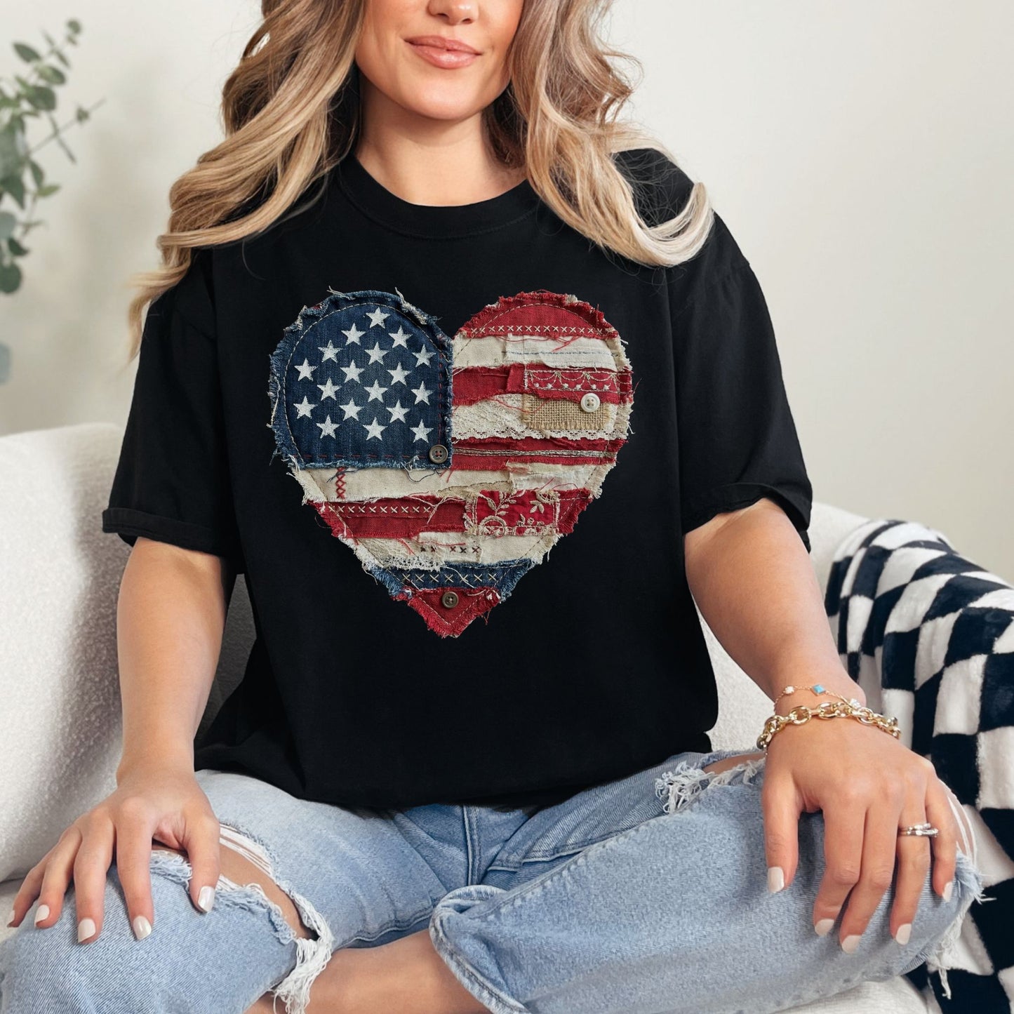 Model is wearing "American Heart Flag Faux Patchwork" graphic on a black T-Shirt.