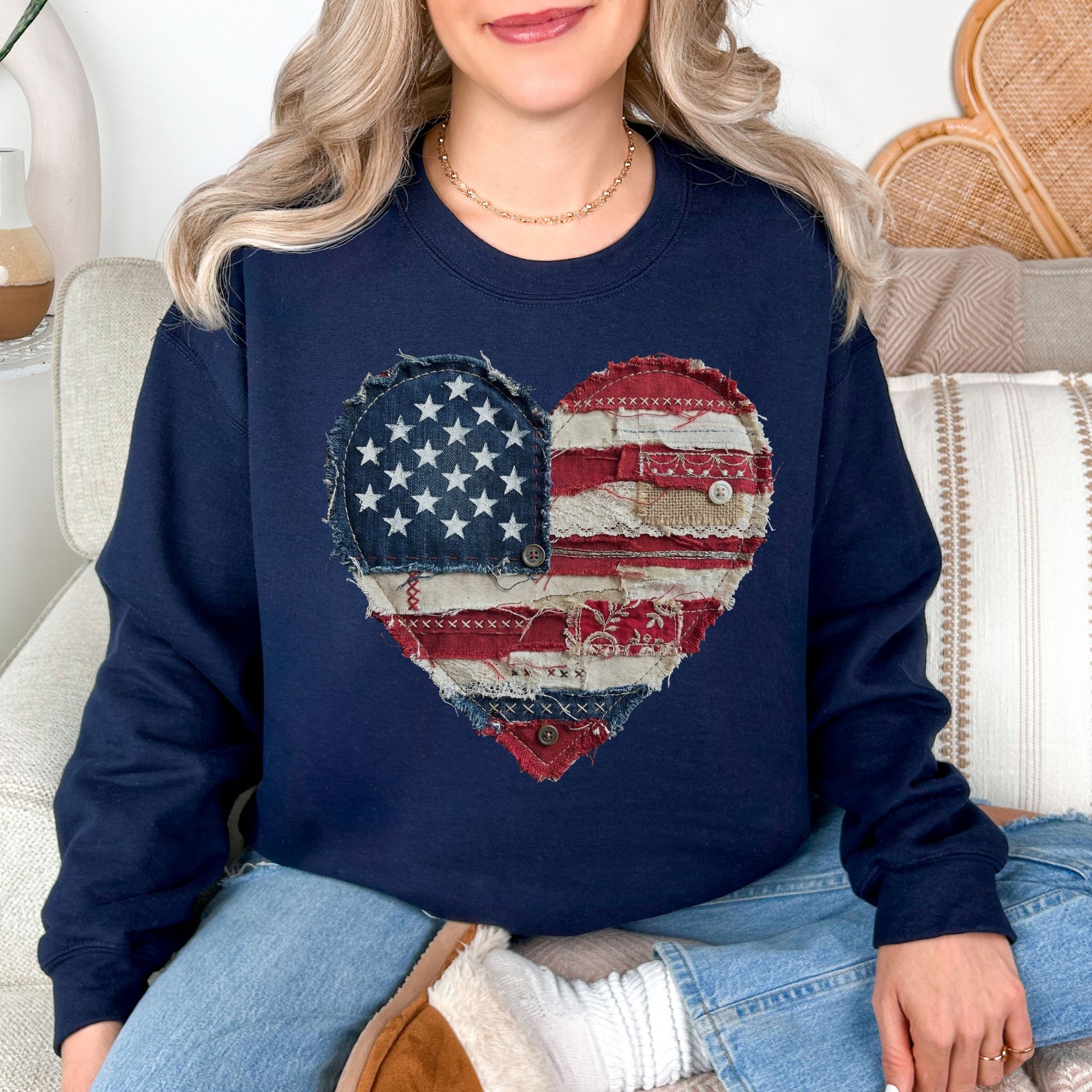 Model is wearing "American Heart Flag Faux Patchwork" graphic on dark blue (navy) sweatshirt.