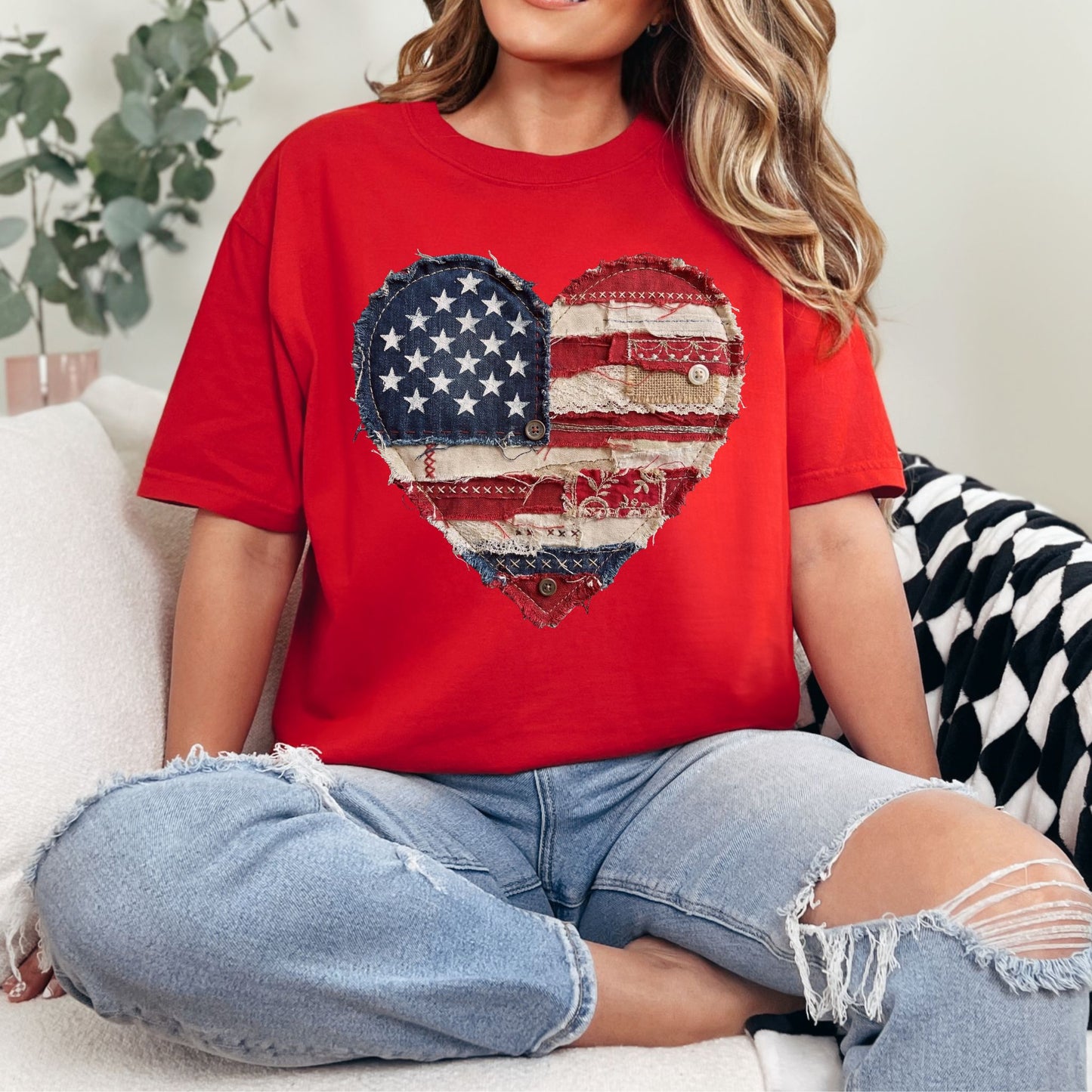 Model is wearing "American Heart Flag Faux Patchwork" graphic on classic true red (red) T-Shirt.