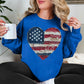 Model is wearing "American Heart Flag Faux Patchwork" graphic on bright medium blue (royal blue) sweatshirt.