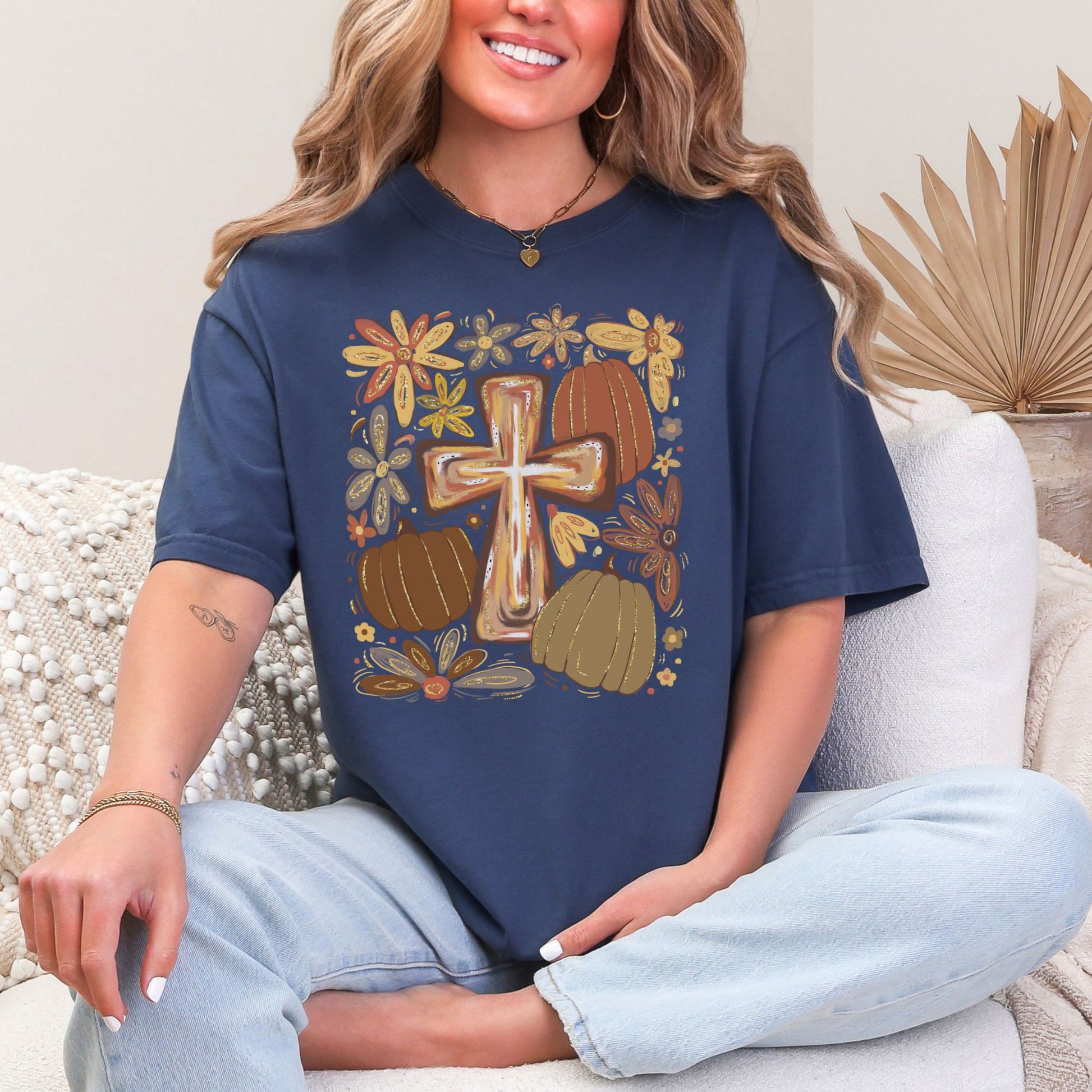 "Autumn pumpkin floral cross" graphic on deep navy blue (navy) Comfort colors 1717 T-shirt.