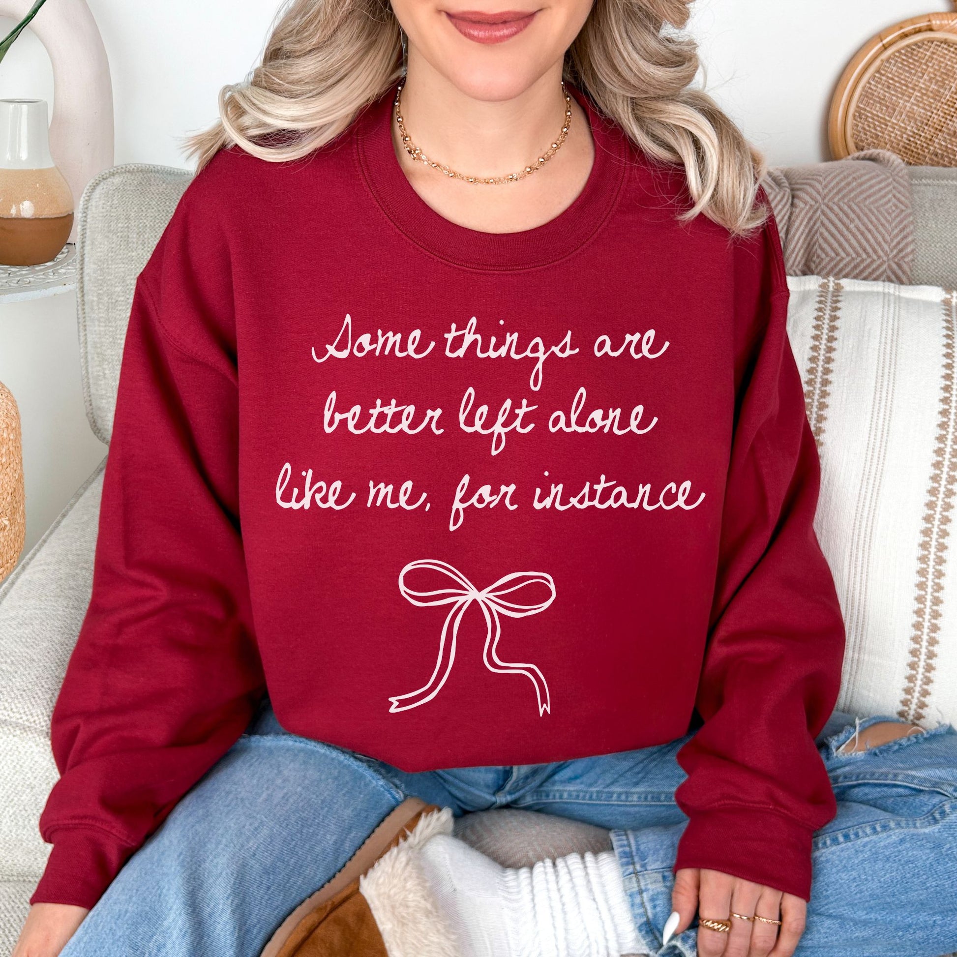 "Better left alone" graphic deep rich red (cardinal red) sweatshirt.