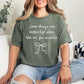 "Better Left Alone" graphic on a muted earthy green (moss) t-shirt.