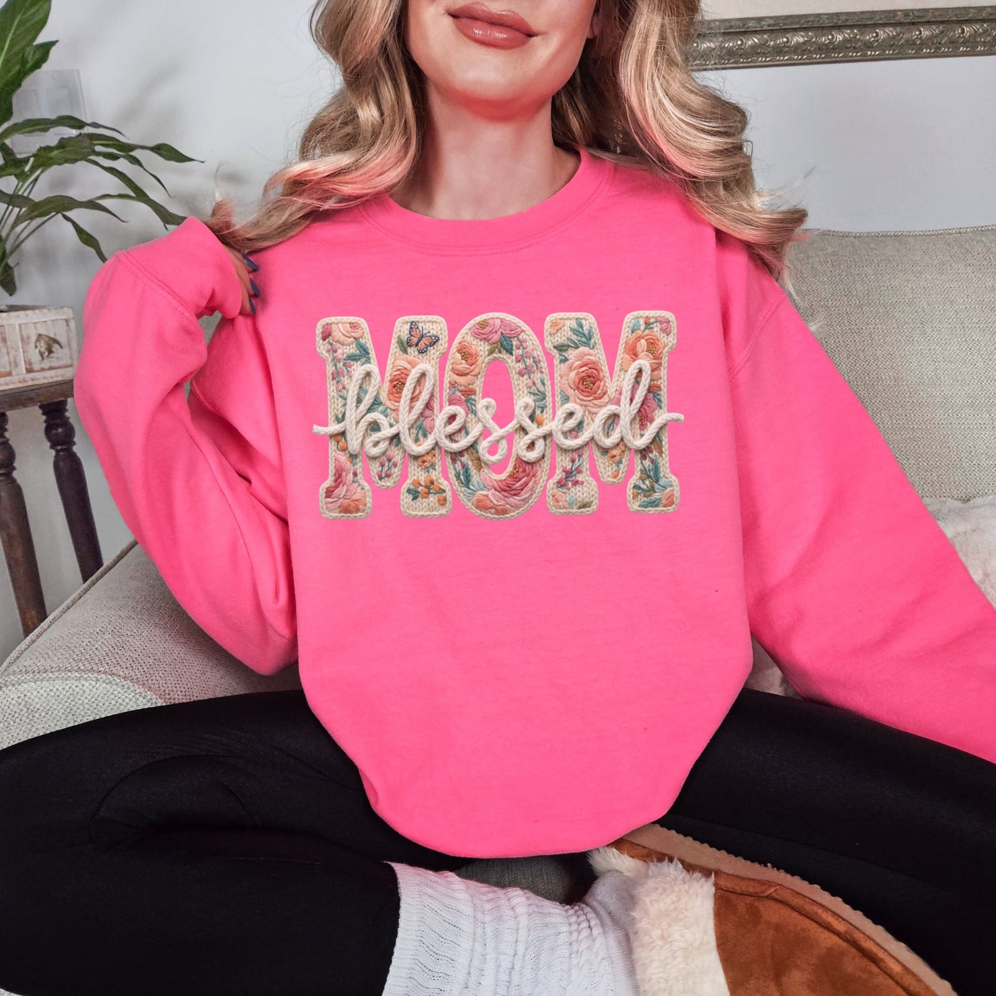 “Blessed Mom" graphic on bright neon pink (safety pink) sweatshirt.