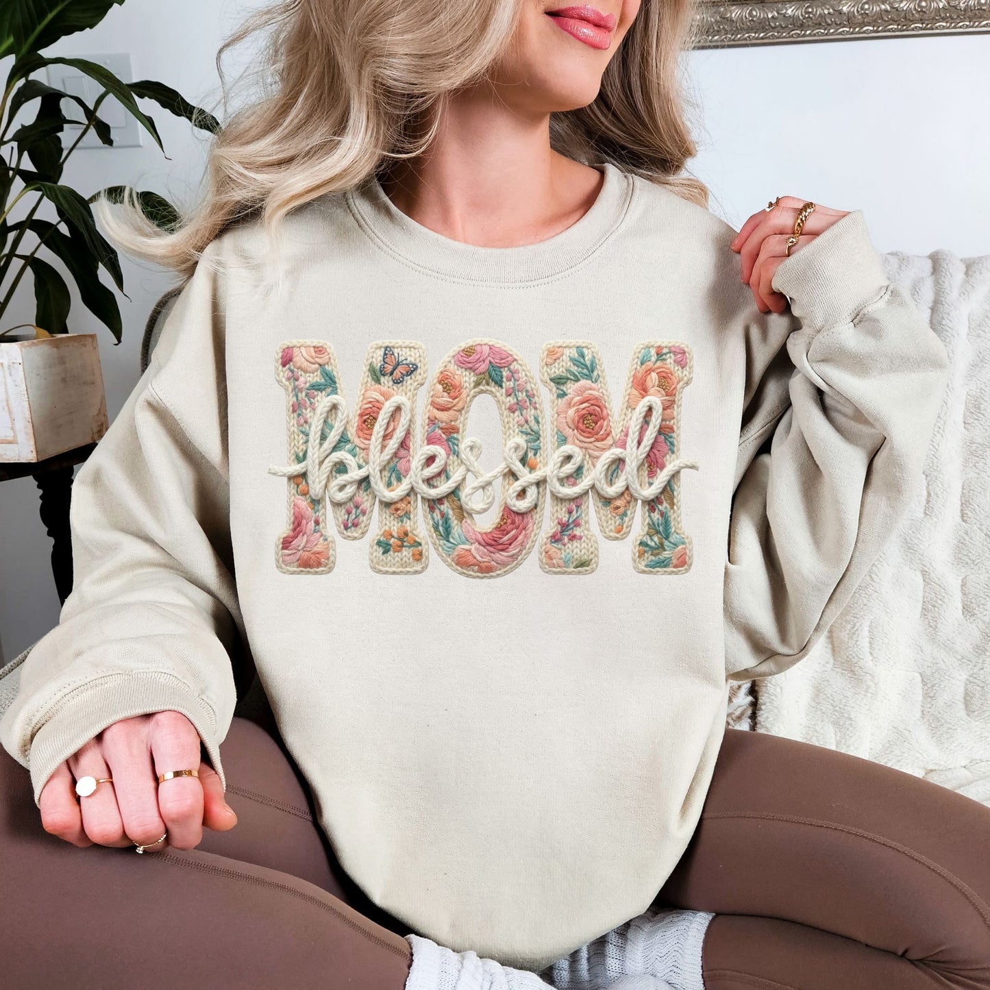 “Blessed Mom" graphic on light beige (sand) sweatshirt.