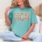 “Blessed Mom" graphic on soft pale mint green (seafoam) t-shirt.