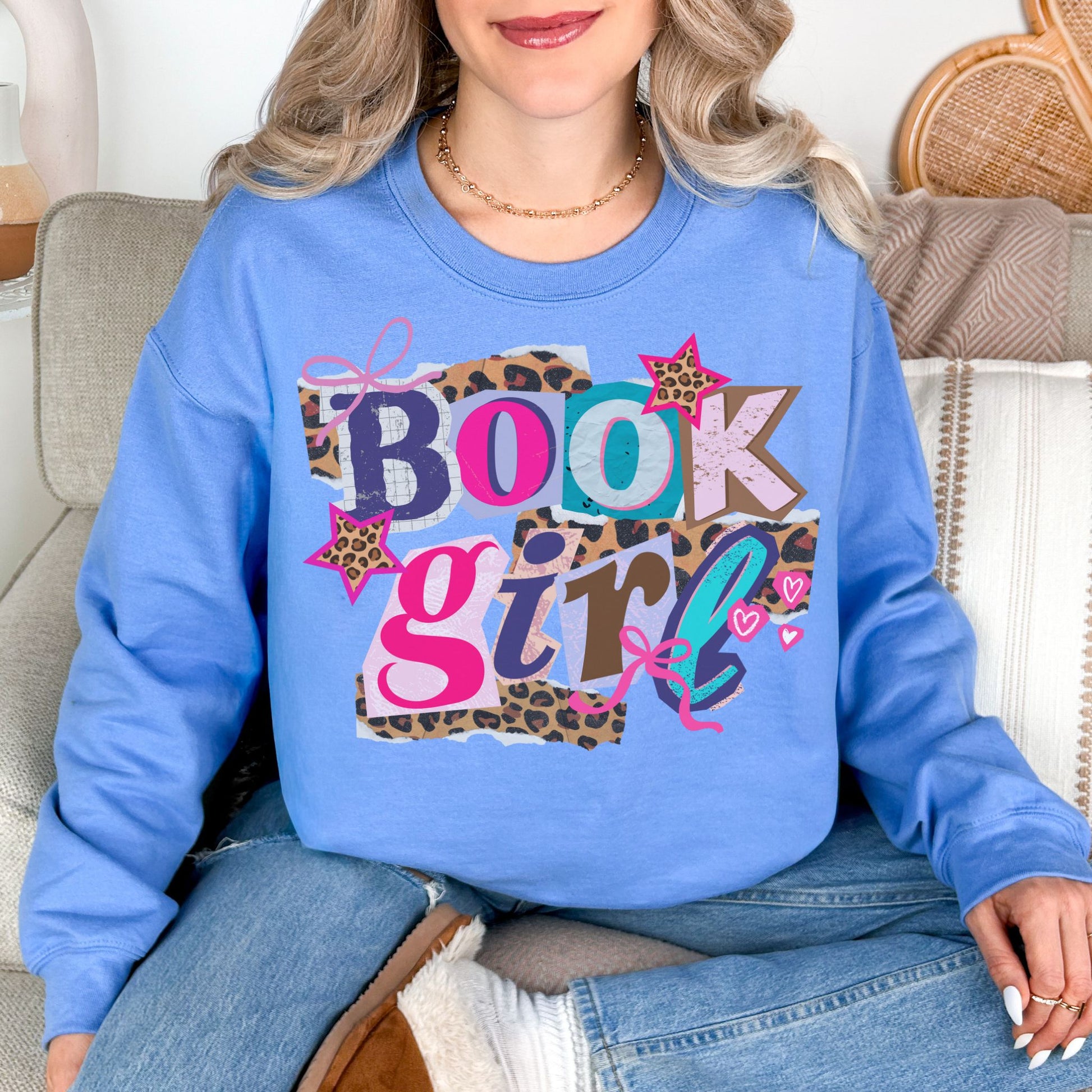 "Book Girl" graphic on soft sky blue (carolina blue) Sweatshirt.