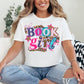 "Book Girl" collage graphic in bright white (white) T-shirt