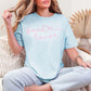 "Book Lover" graphic on a soft medium blue (chambray) T-shirt.