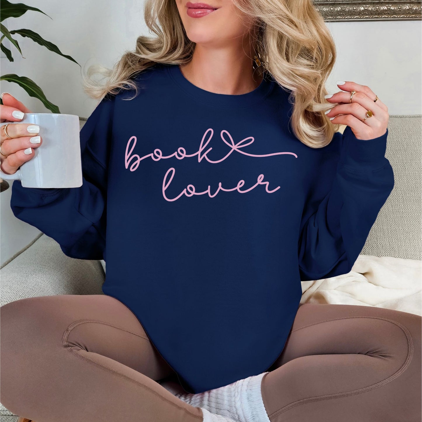 "Book Lover" graphic on deep navy blue (navy) sweatshirt.