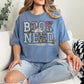 "Book Nerd" graphic on a muted denim blue (blue jean) t-shirt.