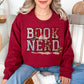 "Book Nerd" graphic on deep rich red (cardinal red) Sweatshirt