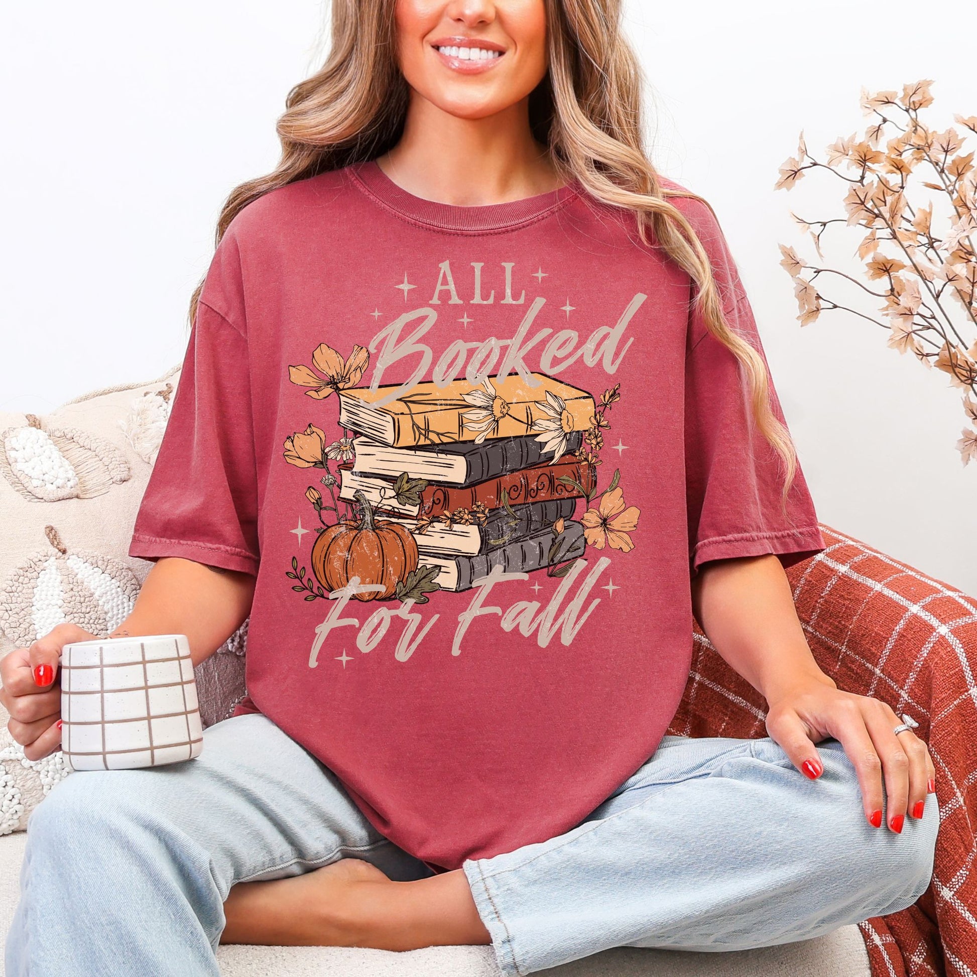 "All Booked for Fall" graphic on soft muted warm brick red (brick) Comfort Colors 1717 T-Shirt. 