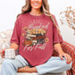 "All Booked for Fall" graphic on soft muted warm brick red (brick) Comfort Colors 1717 T-Shirt. 