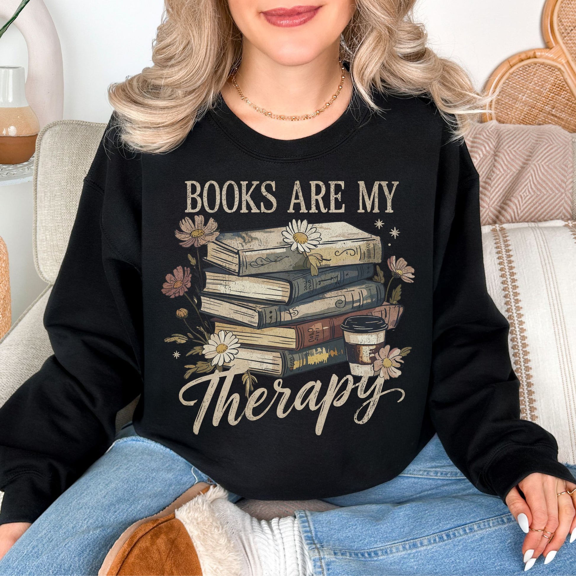 “Books are my therapy" graphic on rich deep black (black) Sweatshirt