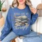 “Books are my therapy" graphic on rich medium-dark blue (indigo blue) Sweatshirt