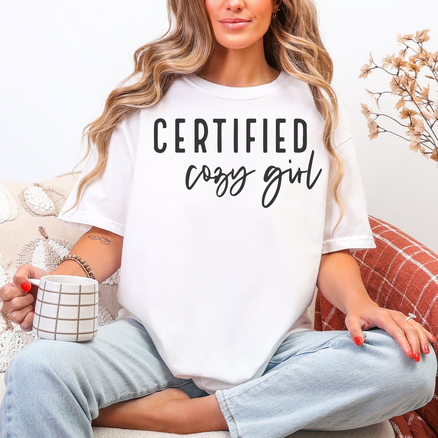 “Certified Cozy Girl" graphic on bright white (white) t-shirt.