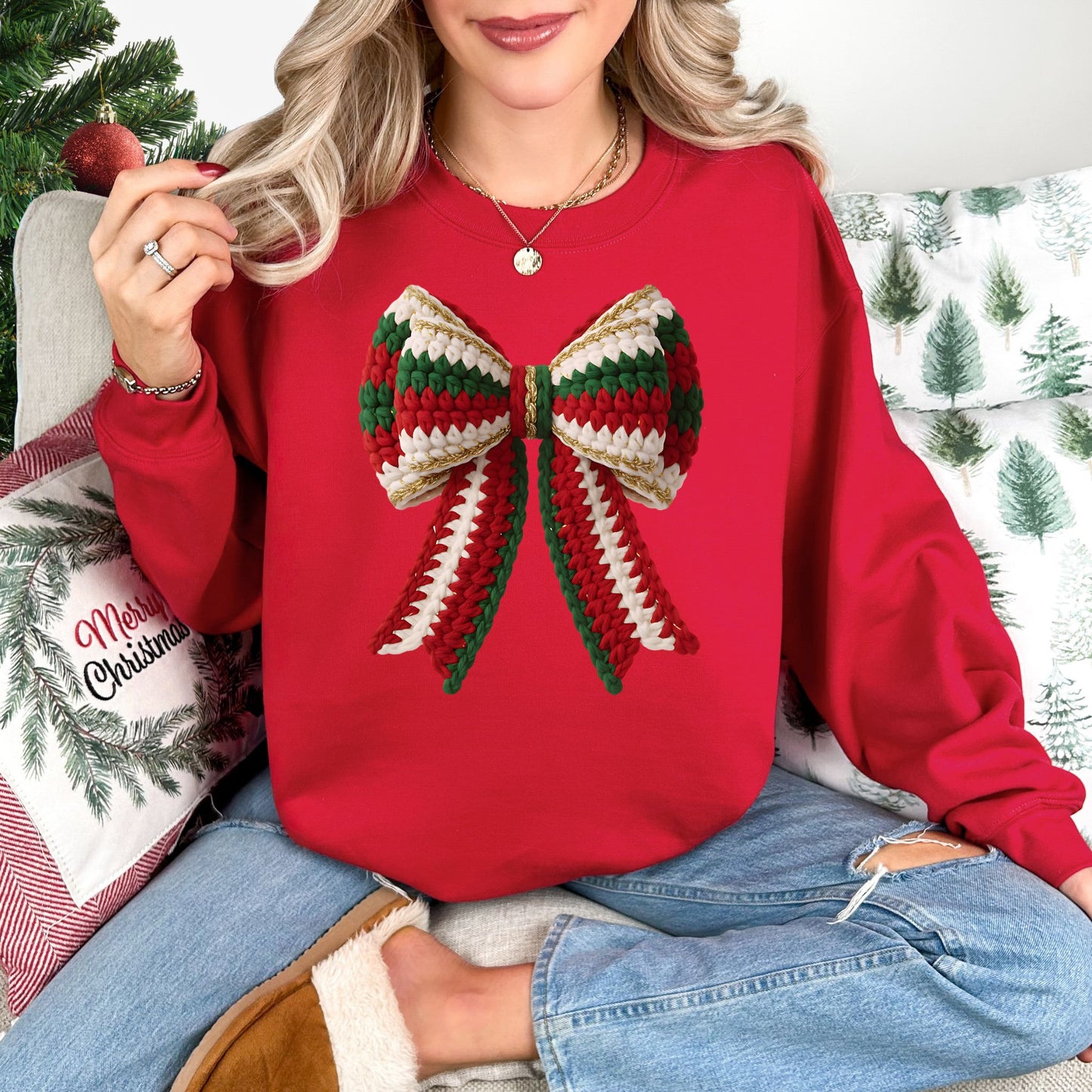 "Christmas Faux Crochet Bow" Design graphic on a bright red (cherry red) sweatshirt.