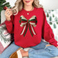 "Christmas Faux Crochet Bow" Design graphic on a bright red (cherry red) sweatshirt.