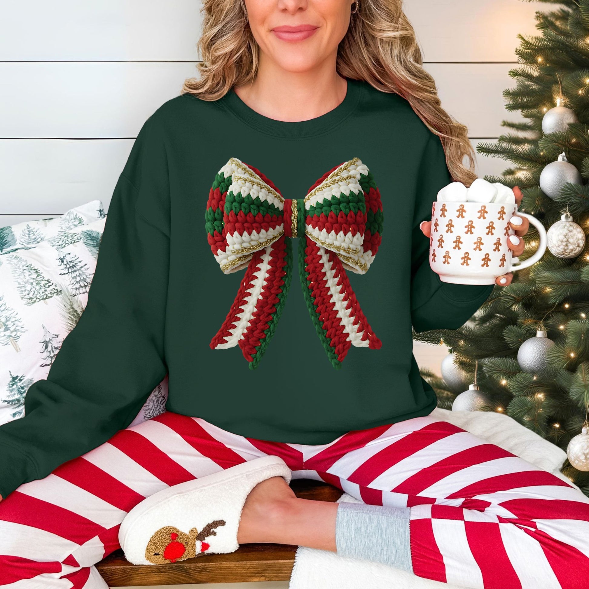 "Christmas Faux Crochet Bow" Design graphic on a dark green (forest green) sweatshirt.