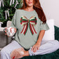 "Christmas Faux Crochet Bow" Design graphic on muted teal-green (bay) t-shirt.