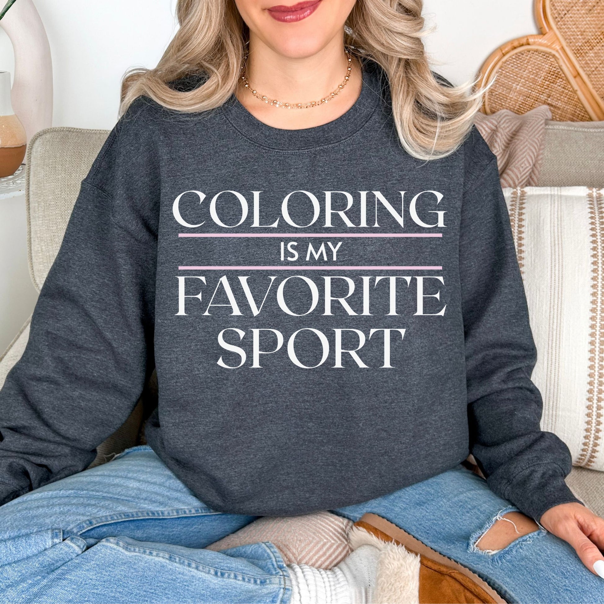 "Coloring Favorite Sport" graphic on medium-dark heather gray (dark heather) sweatshirt.