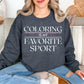"Coloring Favorite Sport" graphic on medium-dark heather gray (dark heather) sweatshirt.