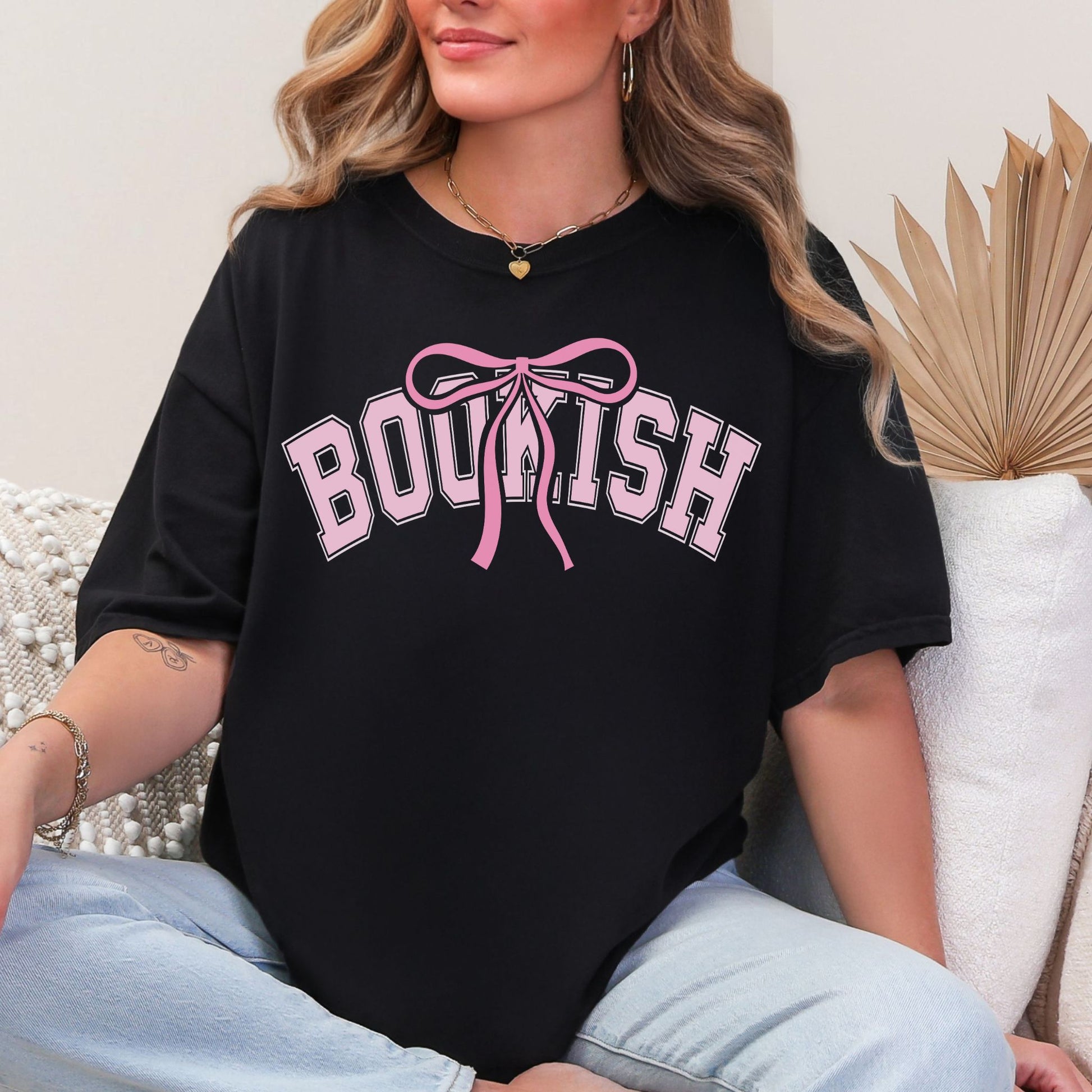 "Coquette Bookish" graphic on a Black t-shirt.