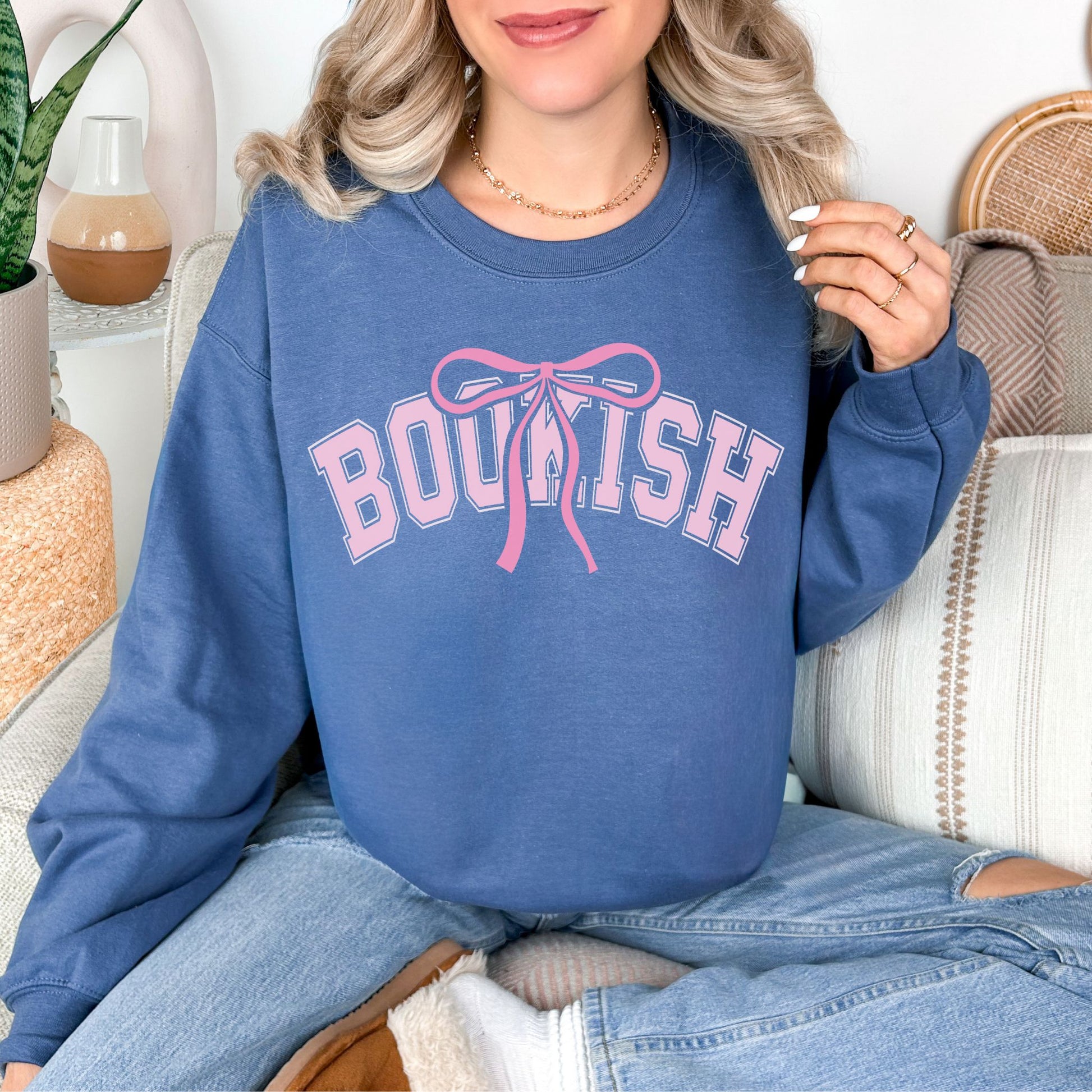 "Coquette Bookish" graphic on rich medium-dark blue (indigo blue) Sweatshirt.