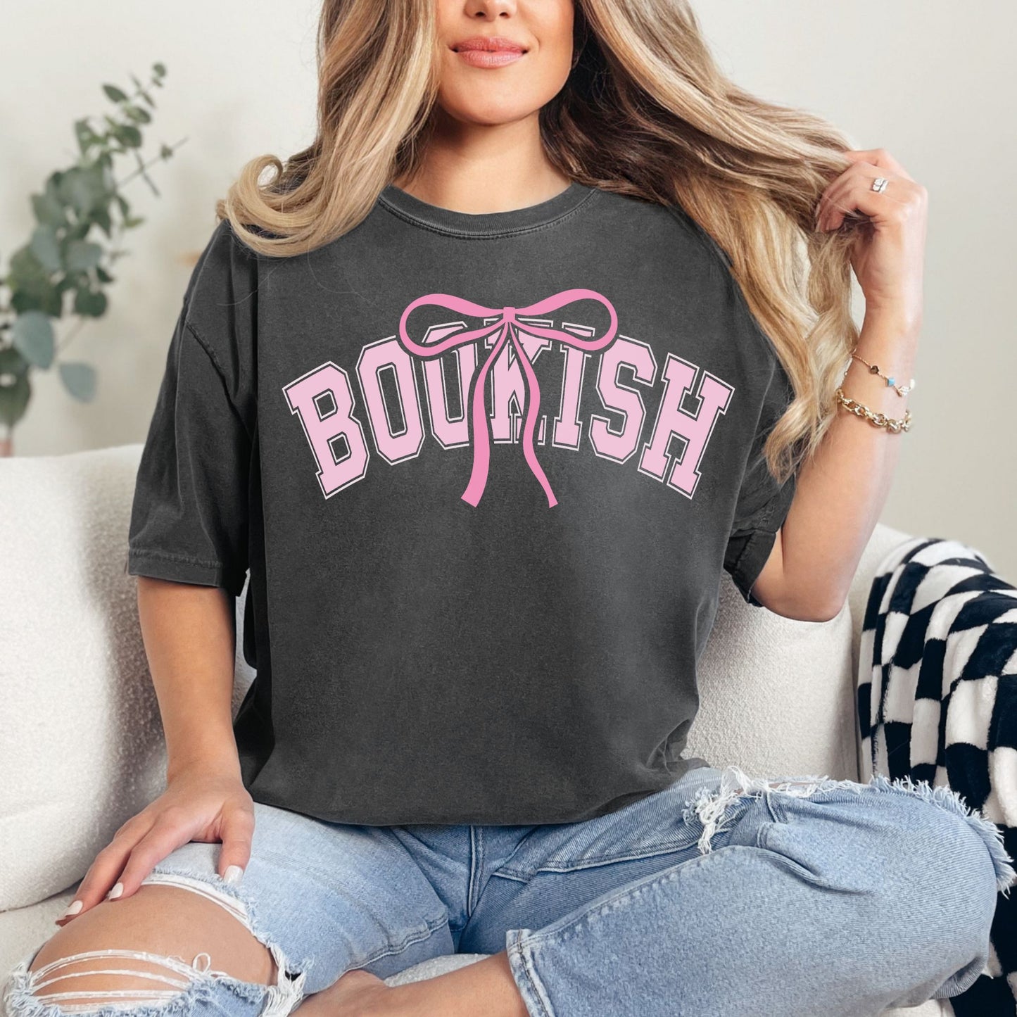 "Coquette Bookish" graphic on dark charcoal gray (pepper) t-shirt.”