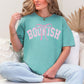 Model is wearing Navy blue (navy) Comfort Colors 17171 T-shirt featuring the word “BOOKISH” in a soft pink varsity type lettering with a pink bow accent centered above the text.