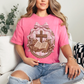 "Coquette Faux Embroidery Bible and Cross" graphic on bright raspberry pink (crunchberry) T-Shirt. 