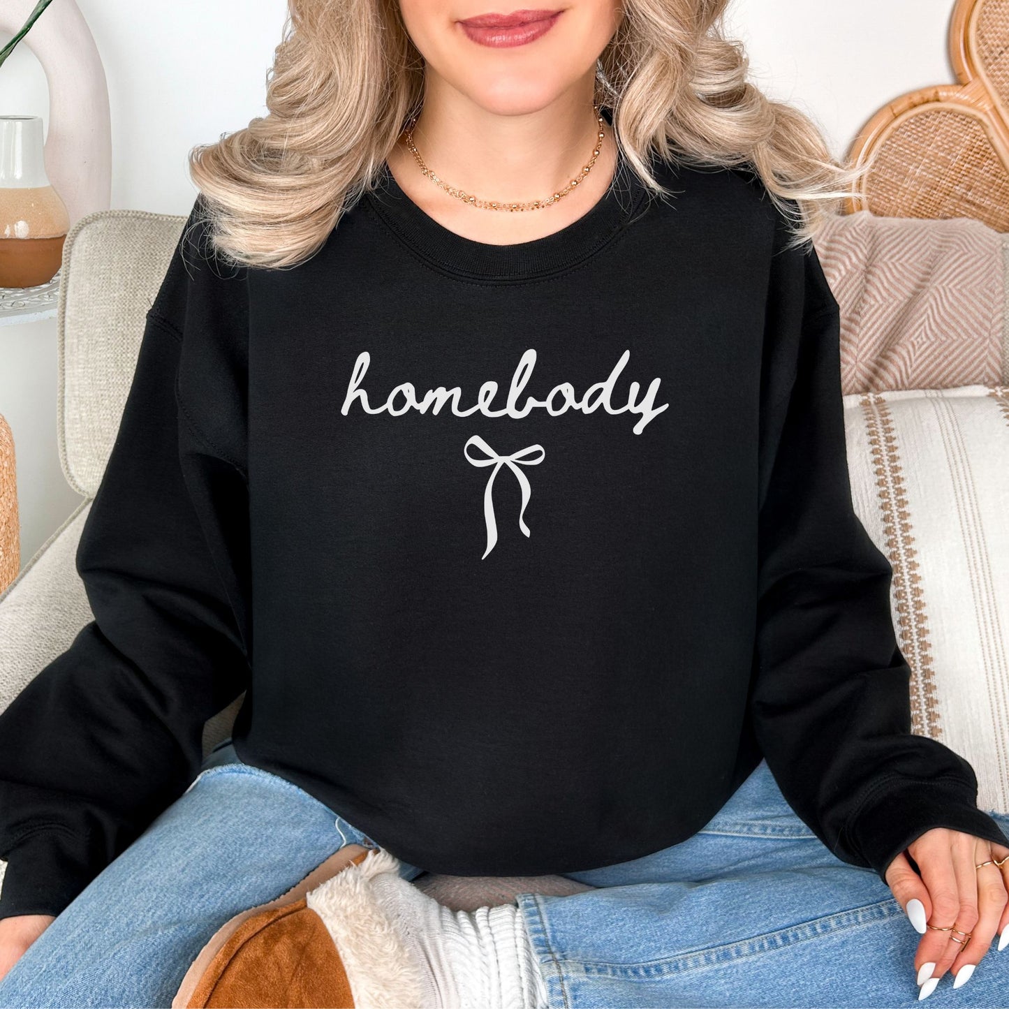 "Coquette Homebody" graphic on deep black (black) sweatshirt.