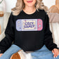 "Cozy Gamer" graphic on deep black (black) Sweatshirt.