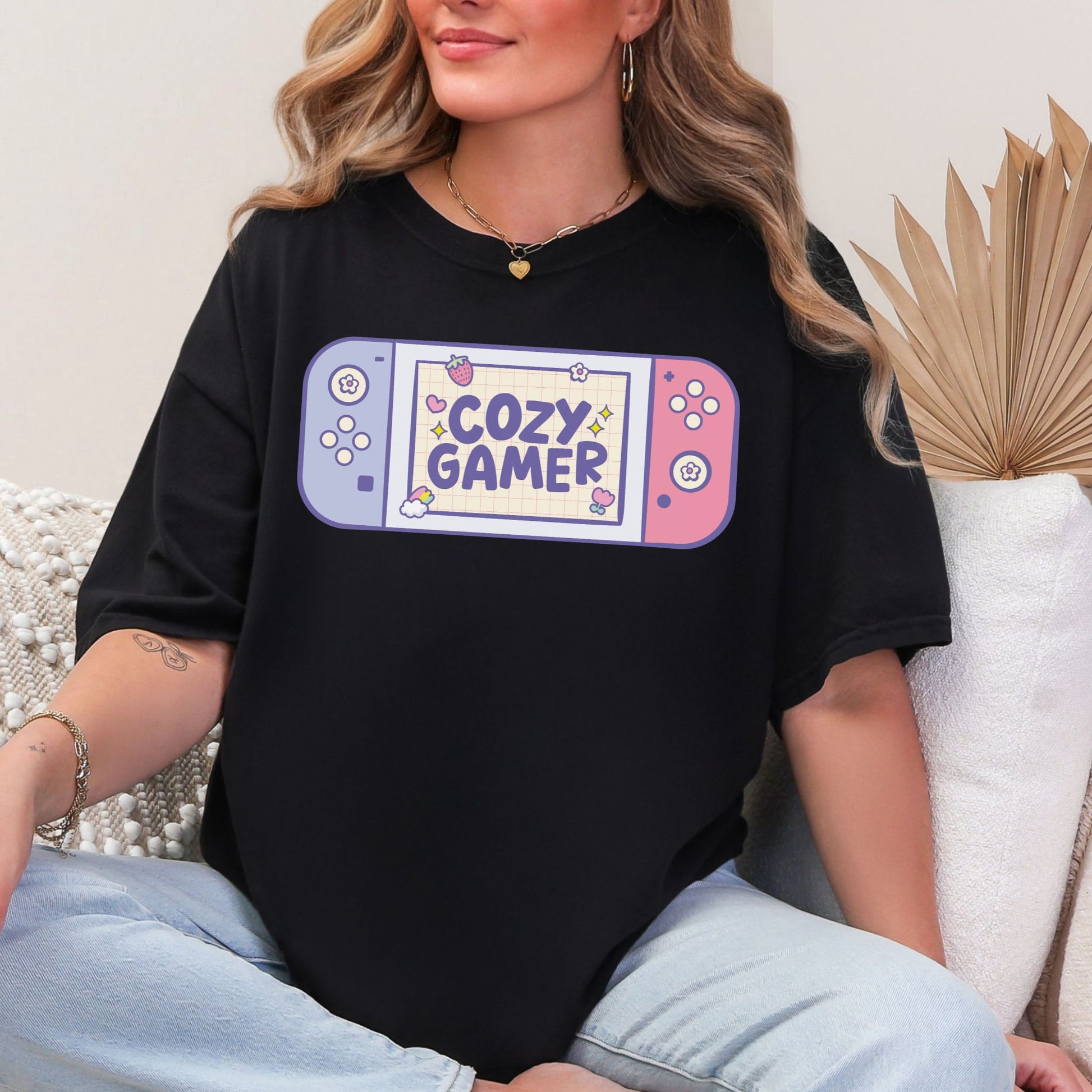 "Cozy Gamer" graphic on a Black T Shirt.