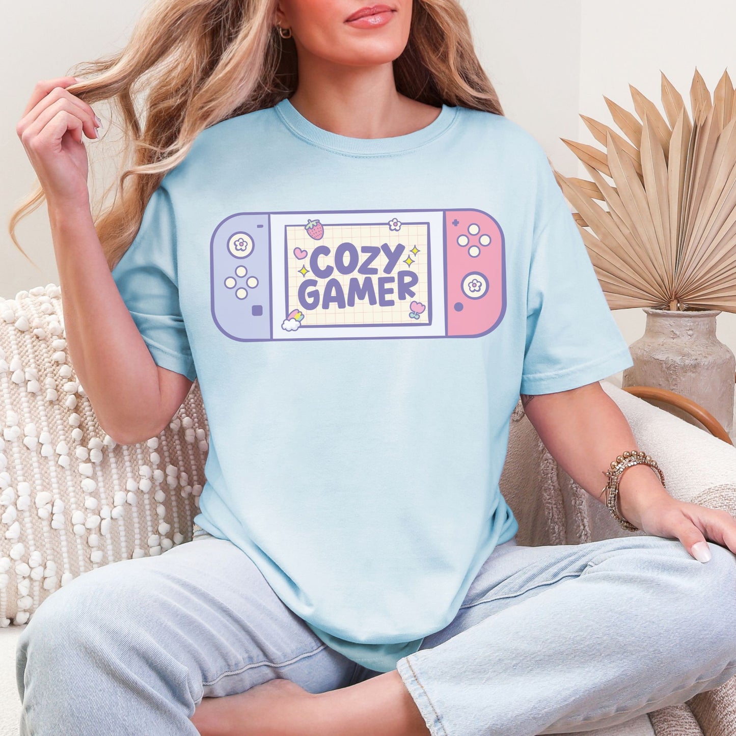 "Cozy Gamer" graphic on a soft medium blue (chambray) T -Shirt.