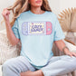 "Cozy Gamer" graphic on a soft medium blue (chambray) T -Shirt.