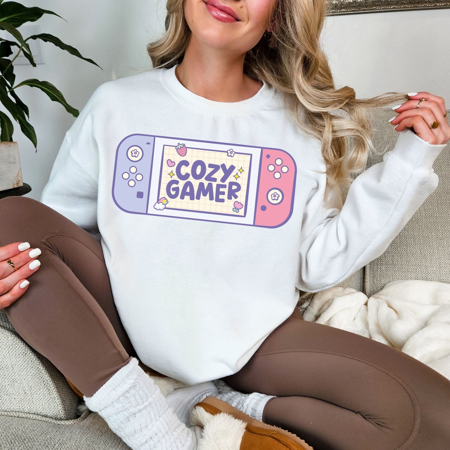 "Cozy Gamer" graphic on clean bright white (white) Sweatshirt.