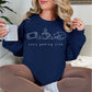 "Cozy gaming club" graphic on dark blue (navy) sweatshirt.