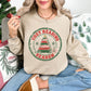 "Distressed Cozy Reading Season" graphic on a Gildan 18000 Sweatshirt in light beige (sand).
