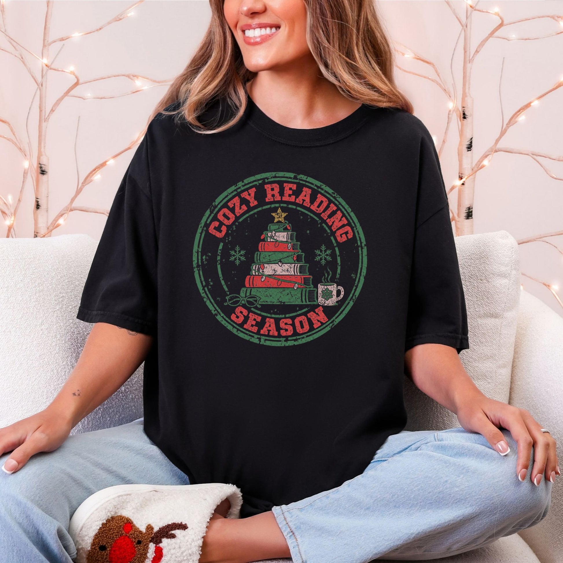 "Distressed Cozy Reading Season" graphic on a black Comfort Colors 1717 T-Shirt. 