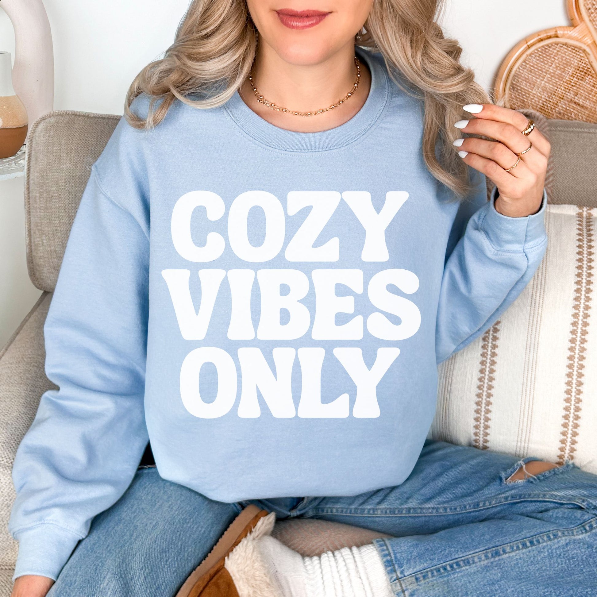 "Cozy Vibes Only" graphic on pale soft blue (light blue) Sweatshirt.