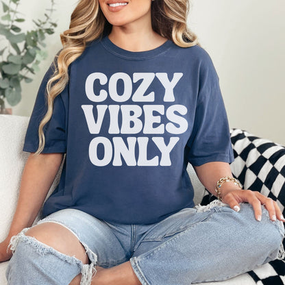 "Cozy vibes only" graphic on deep navy blue (navy) T-shirt.