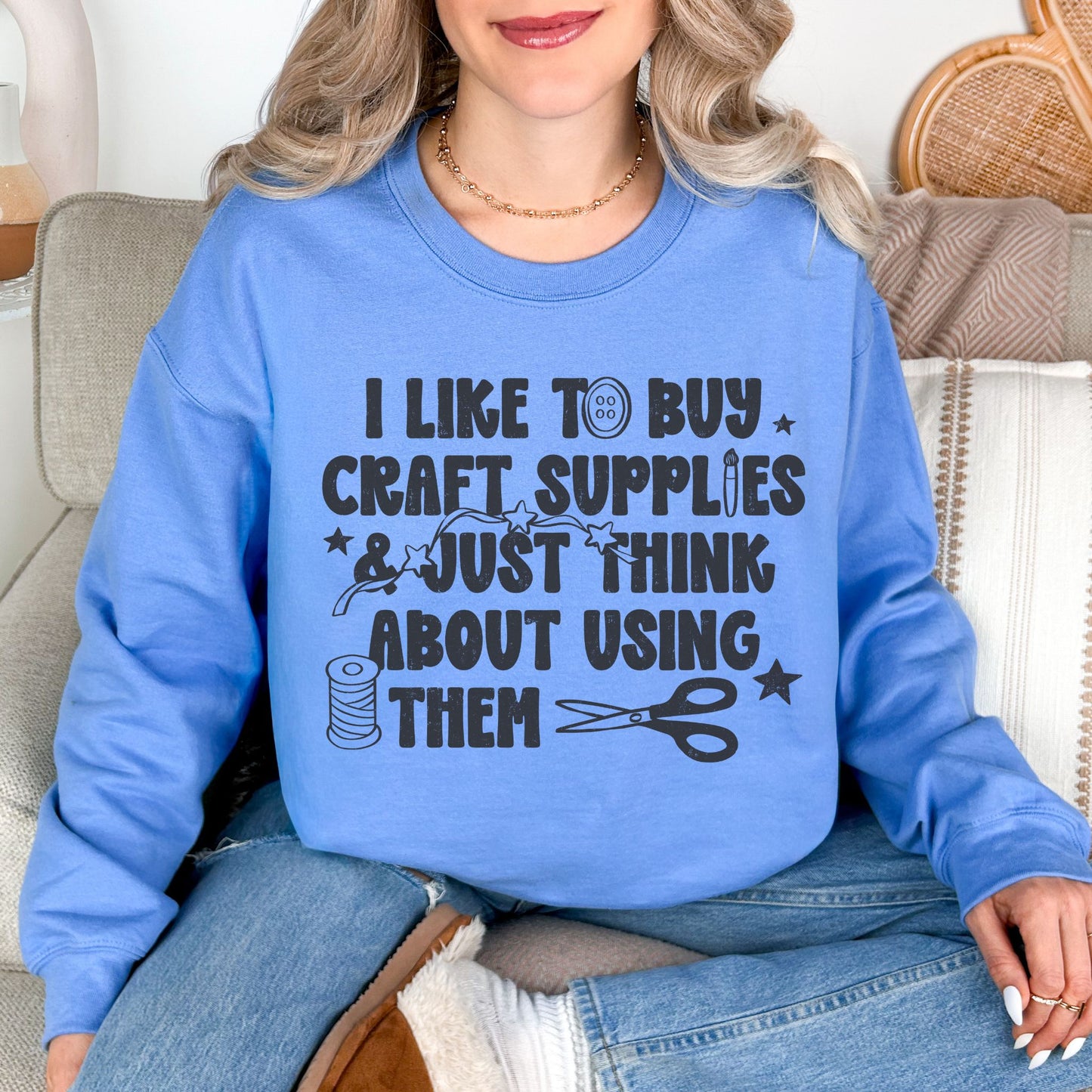 "I like to buy craft Supplies and just think about using them graphic on a light sky blue (carolina blue).