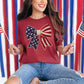 Faux Crochet American Flag Bow" graphic on muted brick red (chili) T-Shirt.