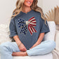 Faux Crochet American Flag Bow" graphic on muted medium blue (denim) T-Shirt.