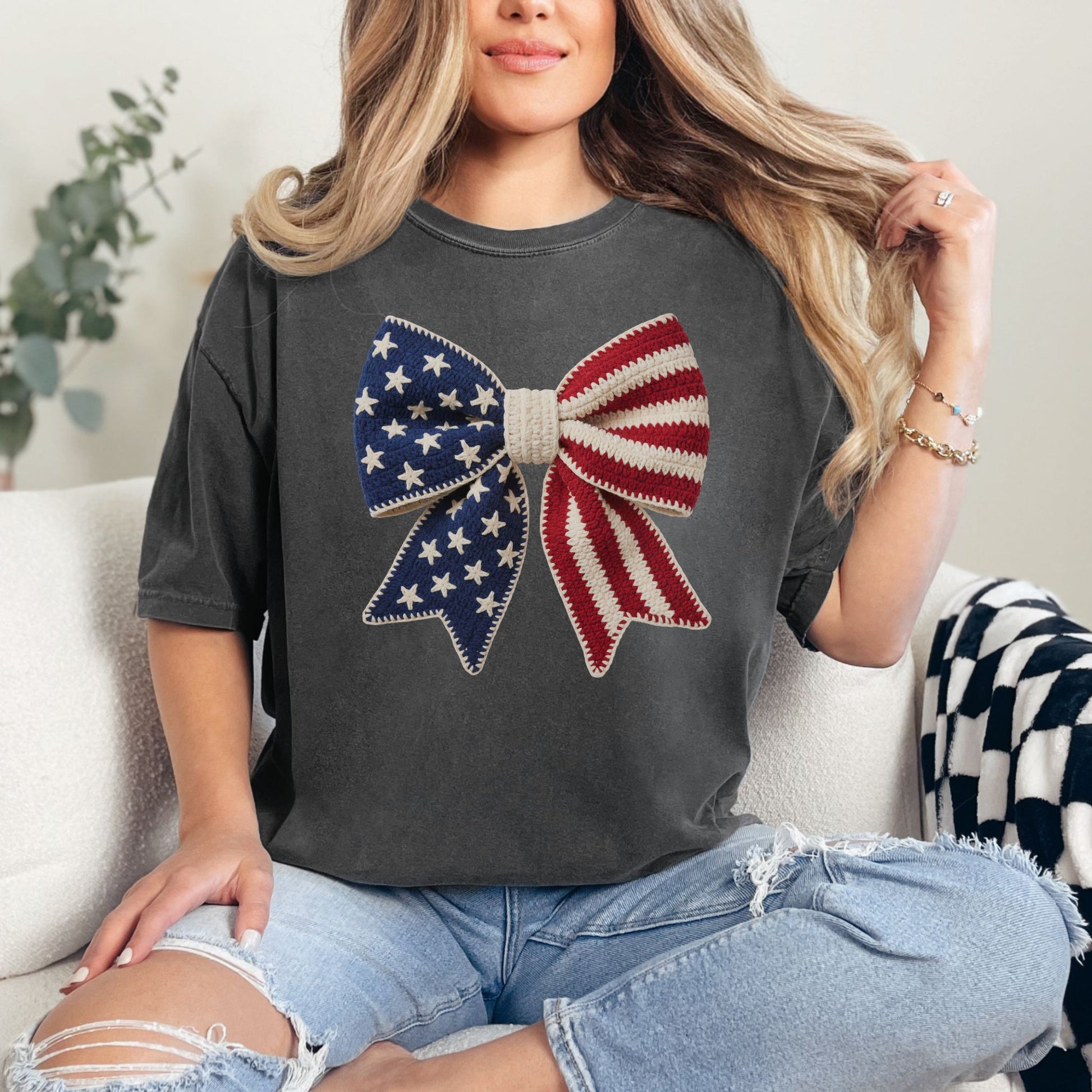 Faux Crochet American Flag Bow" graphic on dark charcoal gray (pepper) T-Shirt.