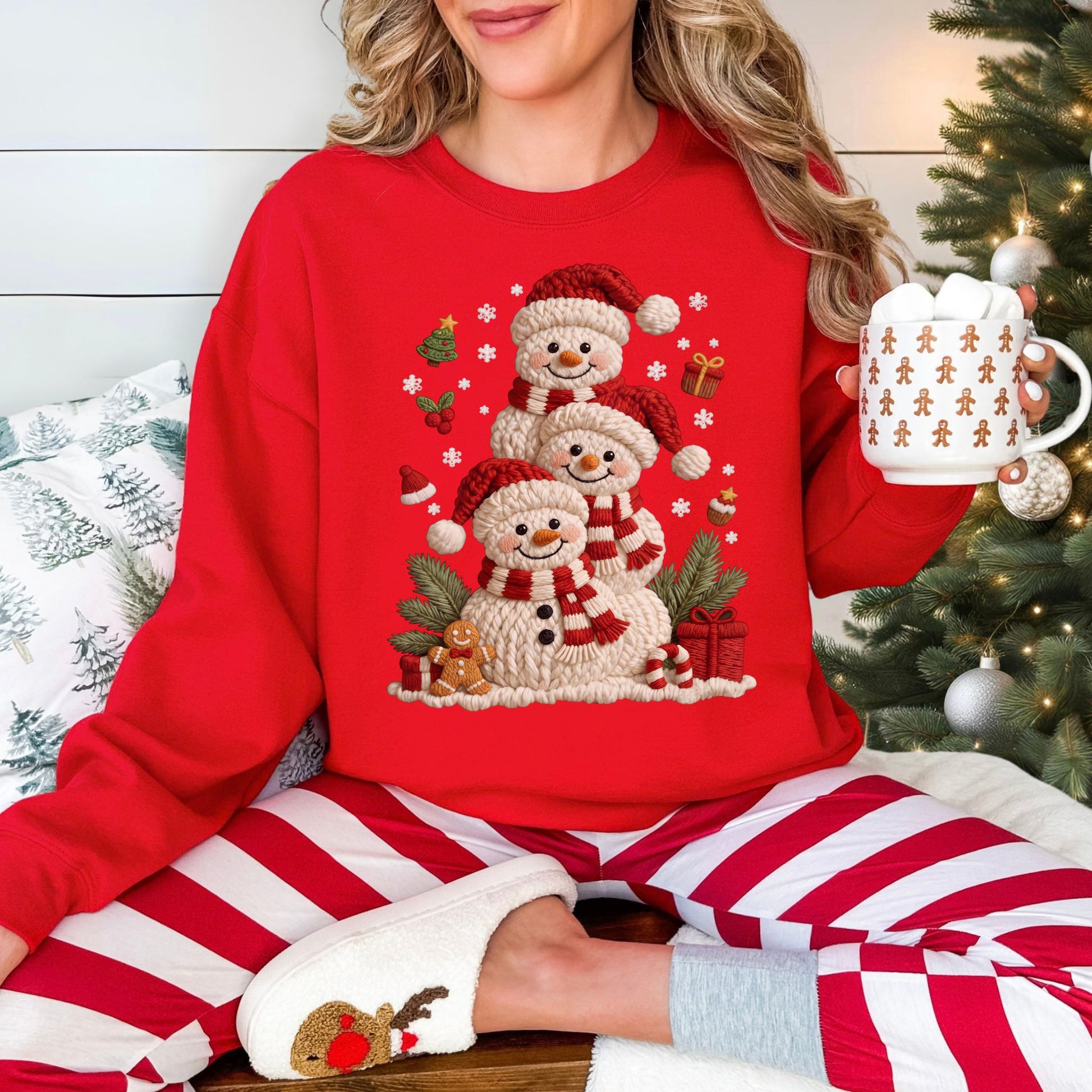 "Christmas Crochet Snowmen" graphic on a Gildan 18000 Sweatshirt in the color true red (red).