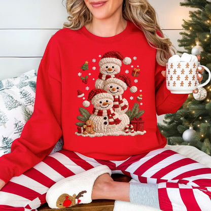 "Christmas Crochet Snowmen" graphic on a Gildan 18000 Sweatshirt in the color true red (red).